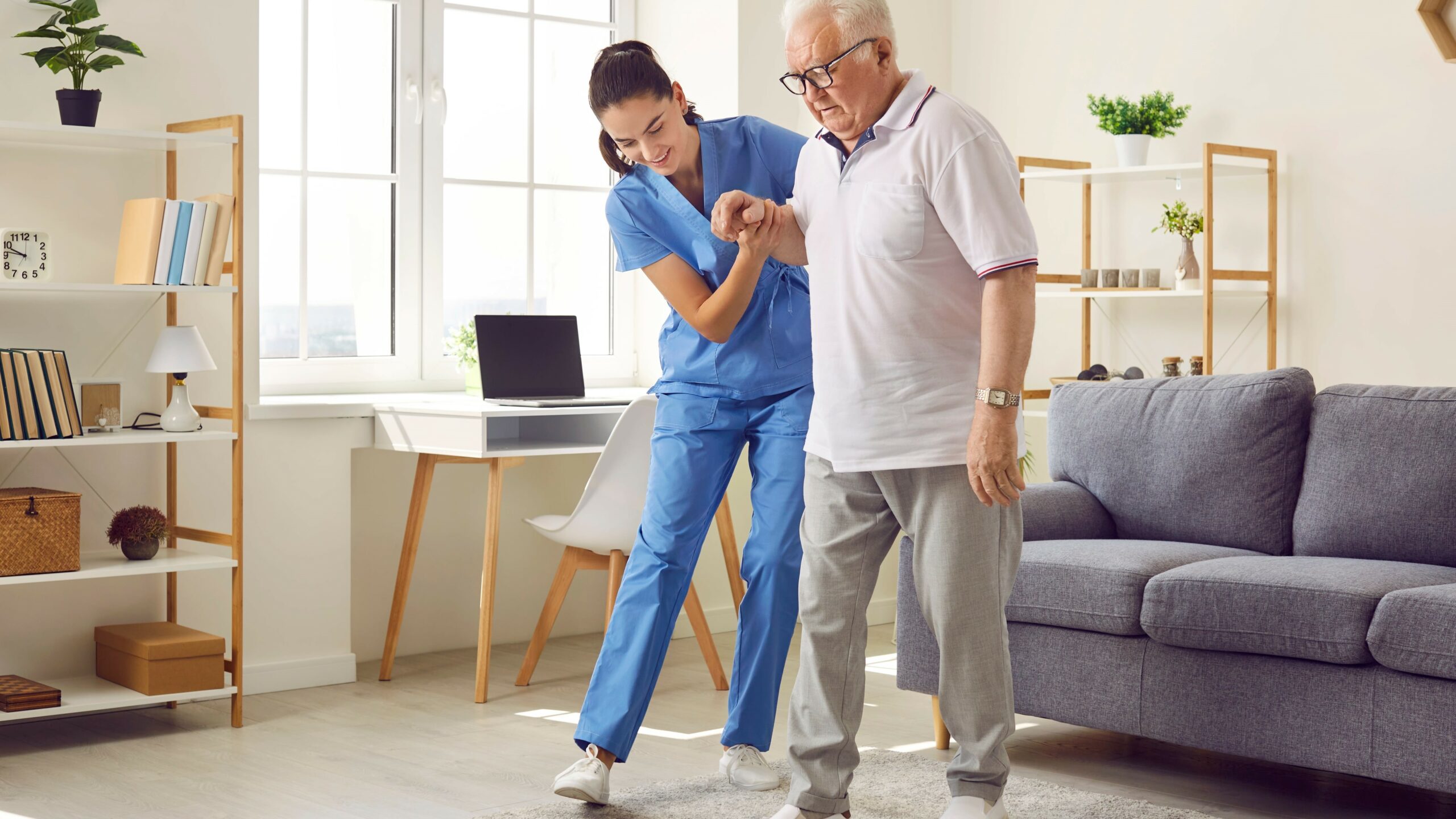 NurseAssistingElderlyPatient min scaled 2
